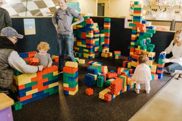 Families play with the jumbo blocks